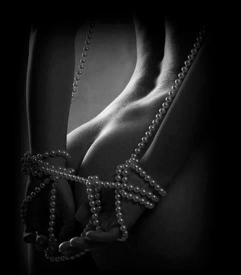 hands-behind-her-back-tied-with-string-of-pearls1.jpg