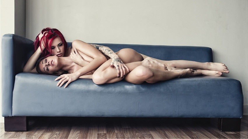 Lesbian-Tattoo-Girl-Nude-On-Sofa.jpg