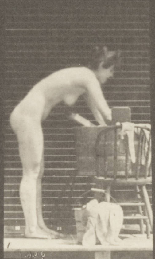 Nude_woman_washing_clothes_at_a_tub_(rbm-QP301M8-1887-432a~1).jpg