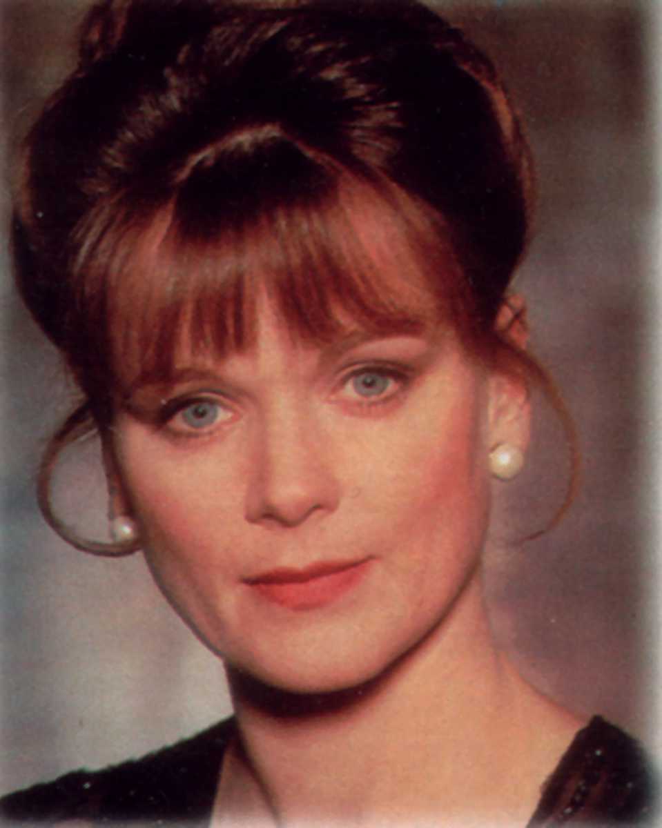 Samantha Bond as Moneypenny.jpg