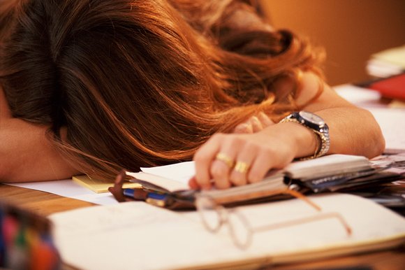 woman-sleeping-desk_121576k.jpg